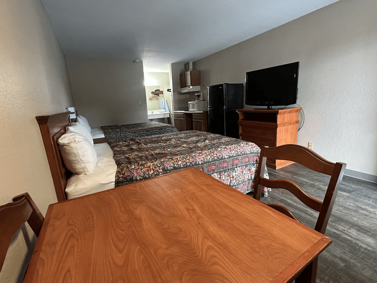 Room with double beds from alternate angle